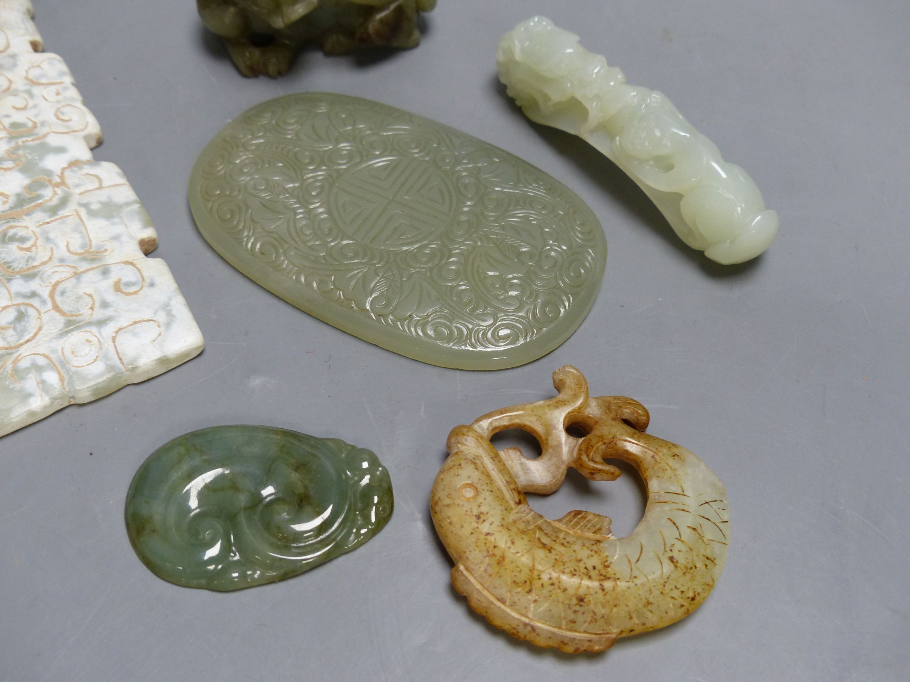 Six Chinese jade or hardstone carvings, longest 13.5cm